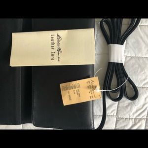 Eddie Bauer black leather wallet/purse with removable cheque holder.